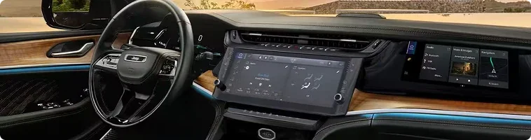 2026 Jeep Grand Cherokee Uconnect 5 touchscreen compared with Toyota Highlander multimedia