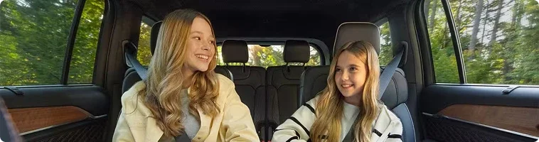 2026 Ford Explorer third row with passengers on a highway trip