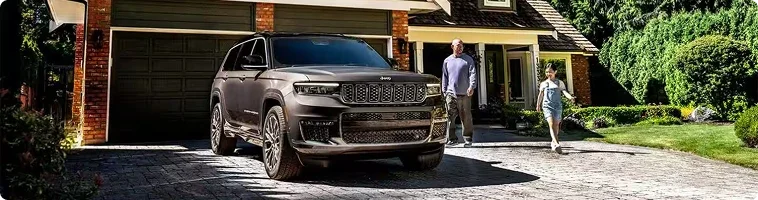 2026 Jeep Grand Cherokee on air suspension climbing a Western Pennsylvania hill