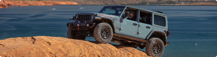 2026 Jeep Wrangler launch pricing compared with the Ford Bronco