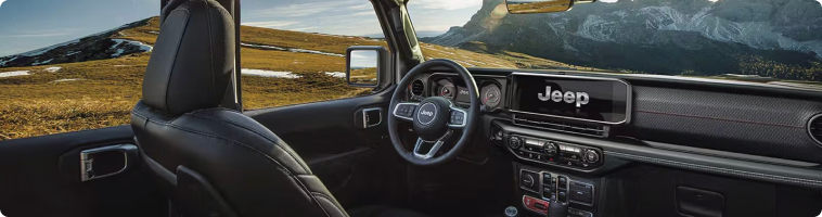 2026 Jeep Wrangler Uconnect 5 touchscreen compared with the Ford Bronco SYNC display