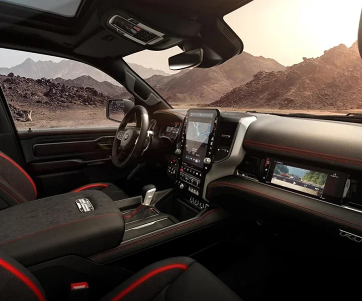 RAM cabin with front passenger display alongside Uconnect touchscreen and digital instrument cluster