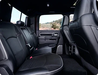 RAM 2500 Mega Cab rear seats showing reclining and fold-flat functionality
